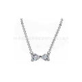 Collar con dije de lazo de tipo diamantes