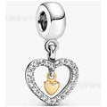 Dije Corazón Doble con Pequeño Corazón Dorado
