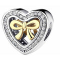 Charm Corazón Dorado con Lazo y Circones