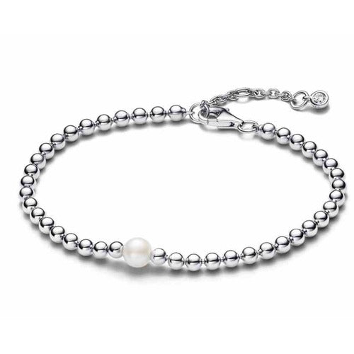 Pulsera de tipo Perlas y Bolitas Plateadas con Dije de Circonita