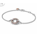 Pulsera Doble Aro Entrelazado con Circonita